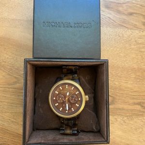 Michael Kors tortoise watch.